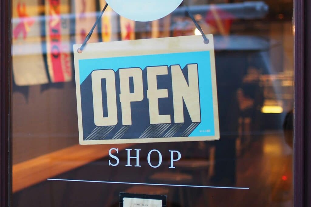 grey and blue Open signage